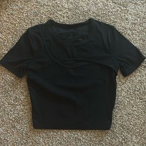 vintage lululemon asymmetrical cut-out top in size 2/4.